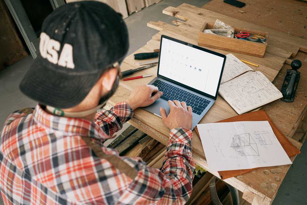 Man typing on laptop