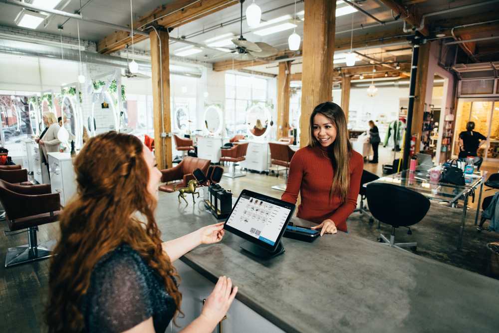 Two women with tablets