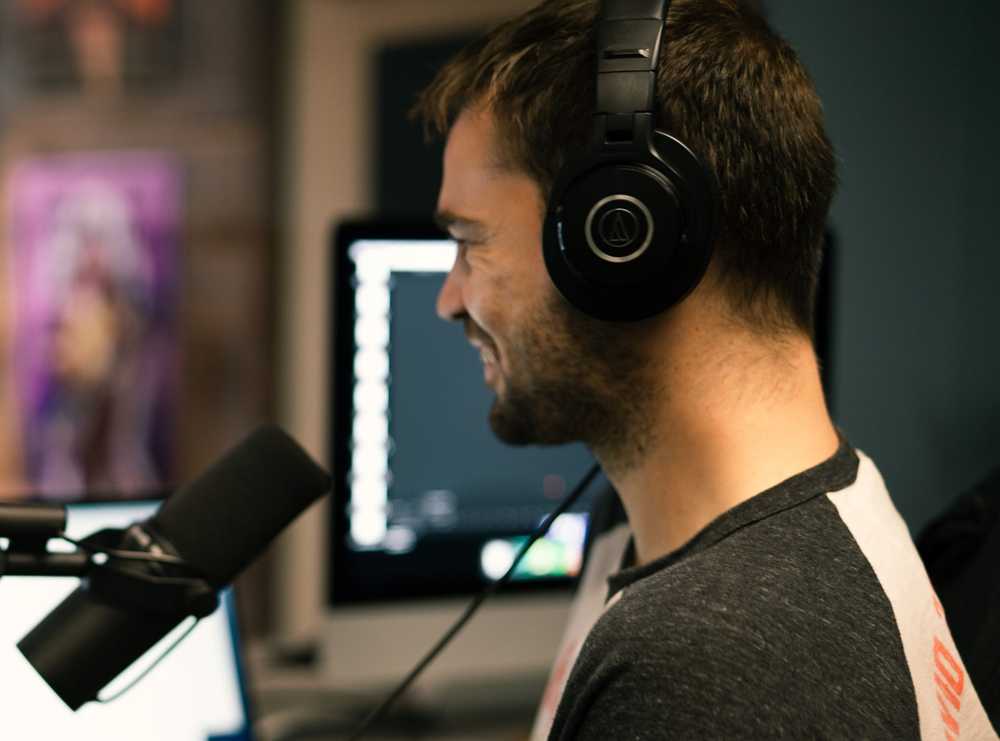Man speaking into microphone