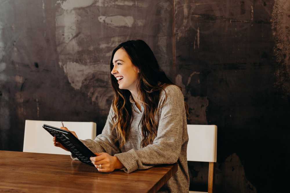 Woman taking notes